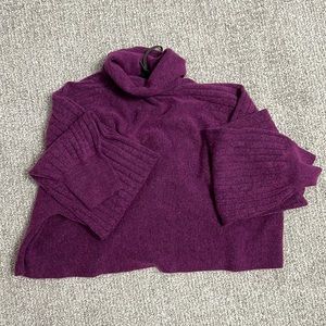 The Margot Sweater. It's ribbed throughout.